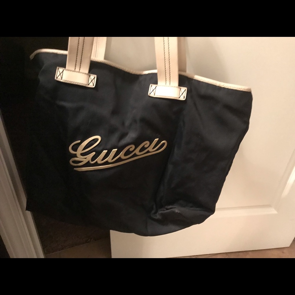 Authentic Gucci navy blue large traveler